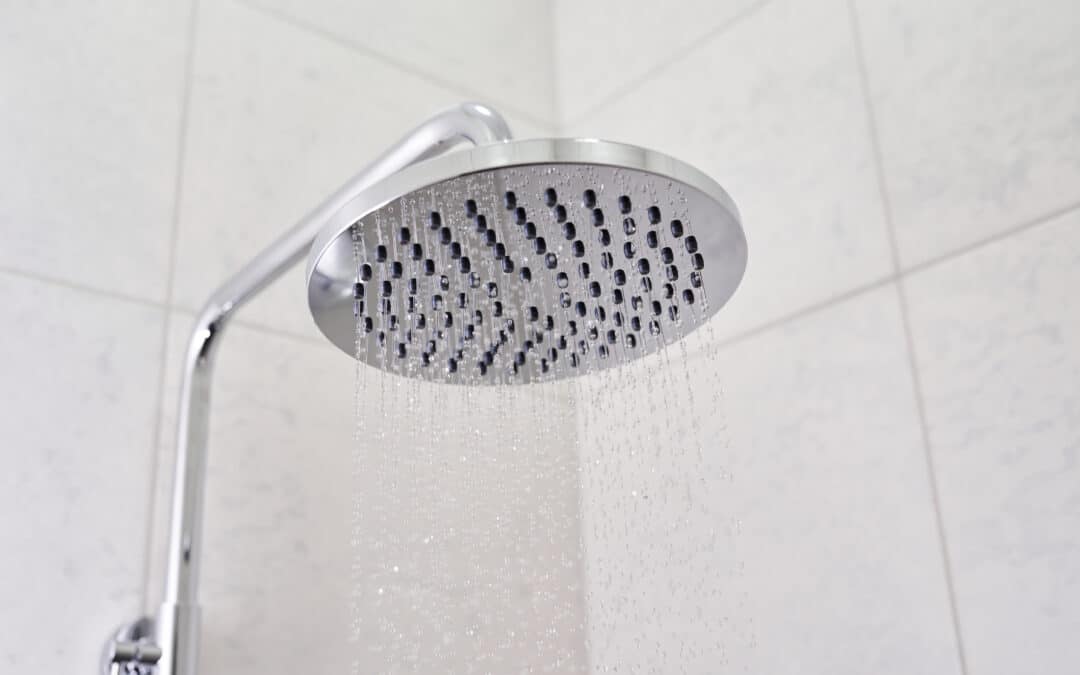 close up on head shower while running water